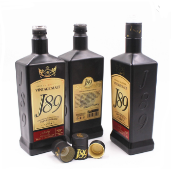 Customized Logo embossed 750ml matt black color with super flint vodka whisky brand liquor glass bottles